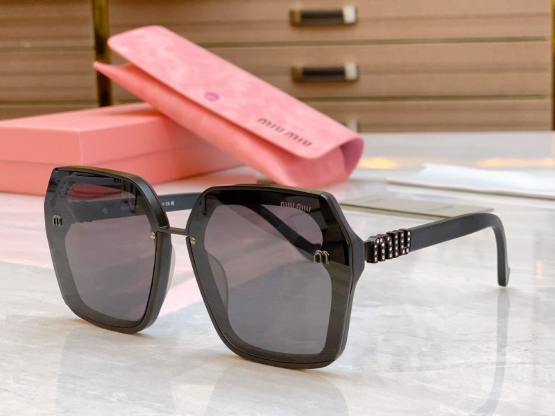 Miu miu Sunglasses